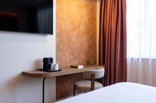 Habitación Clásica Superior con 1 cama queen size del hotel des Colonies Brussels by Mercure. Foto 1