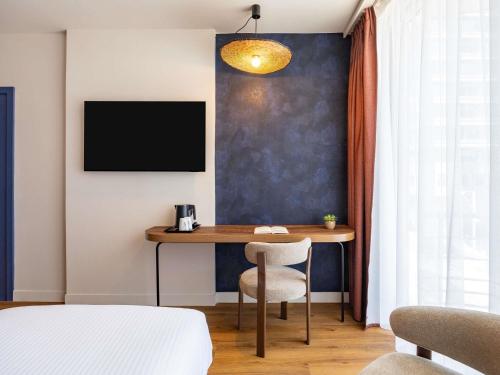 Habitación Clásica Superior con 1 cama queen size del hotel des Colonies Brussels by Mercure. Foto 11