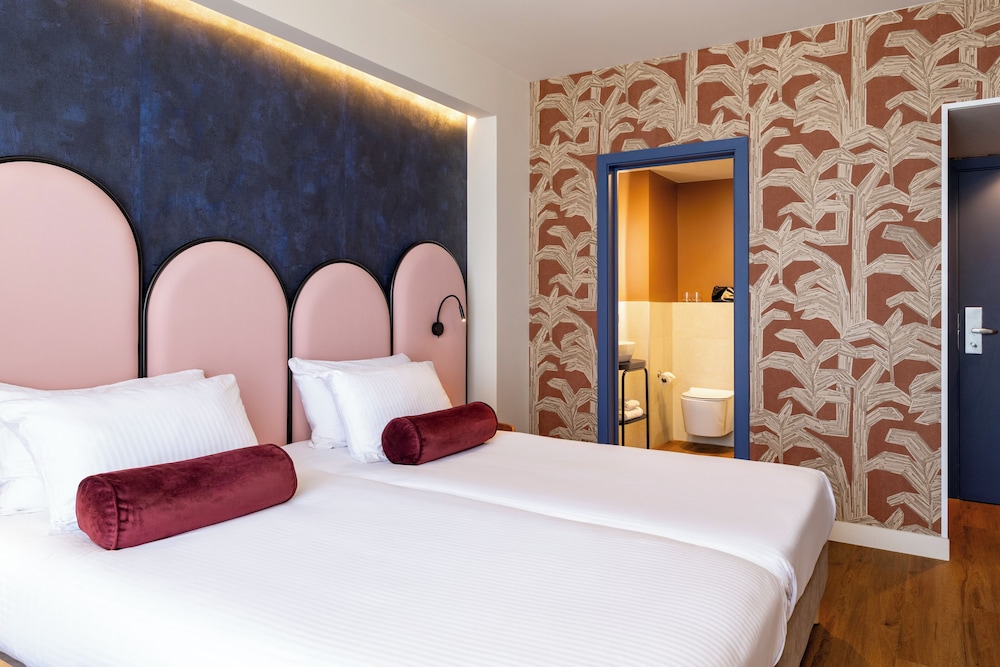 Habitación individual superior, varias camas del hotel des Colonies Brussels by Mercure. Foto 3