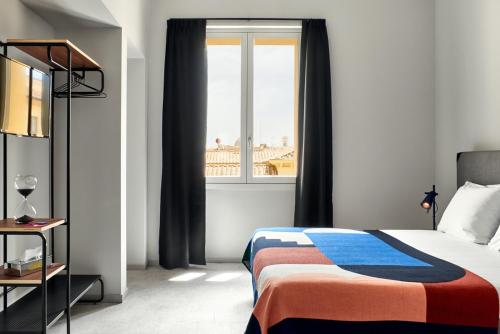 Habitación Executive con cama extragrande del hotel The Social Hub Florence Lavagnini. Foto 3
