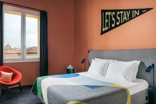 Suite con cama extragrande del hotel The Social Hub Florence Lavagnini. Foto 2