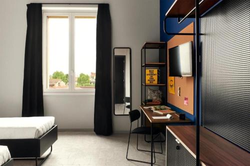 Habitación Doble Deluxe - 2 camas del hotel The Social Hub Florence Lavagnini. Foto 5