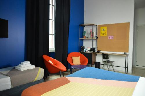 Habitación Triple Executive del hotel The Social Hub Florence Lavagnini. Foto 3