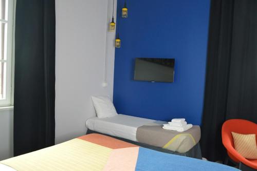 Habitación Triple Executive del hotel The Social Hub Florence Lavagnini. Foto 5