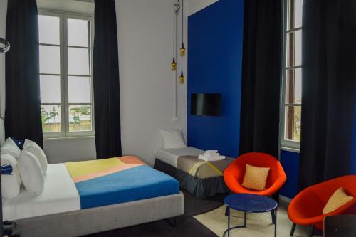 Habitación Triple Executive del hotel The Social Hub Florence Lavagnini. Foto 8