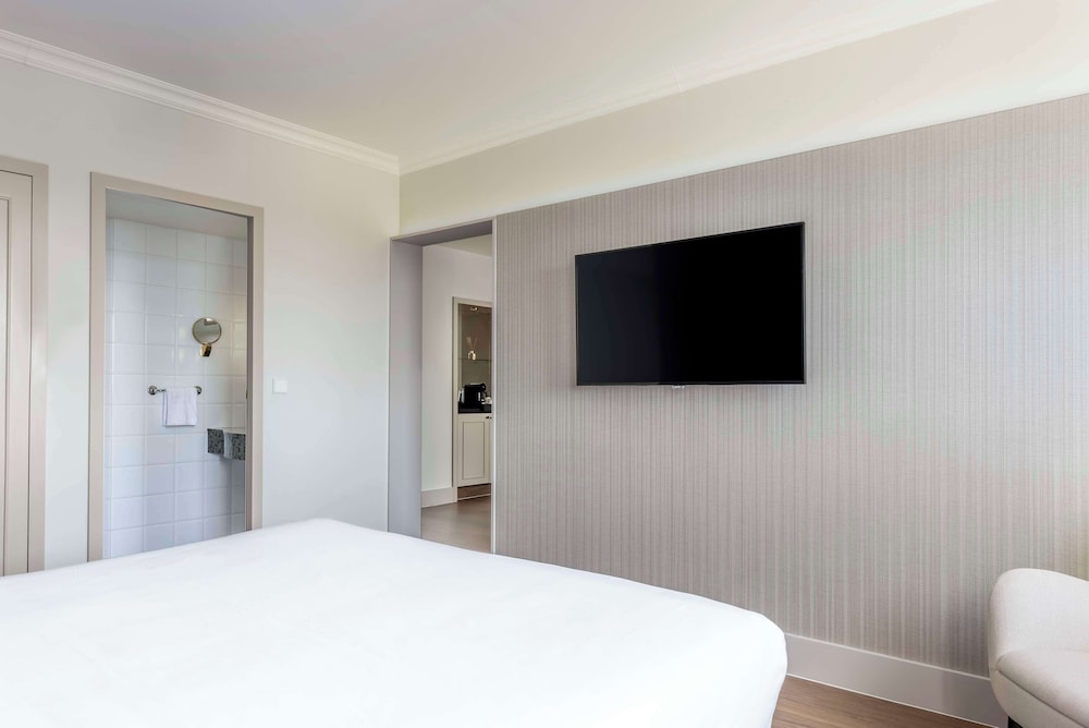 Suite (Extra Bed 2 Adults + 2 Children) del hotel NH Brussels Carrefour de l'Europe. Foto 6