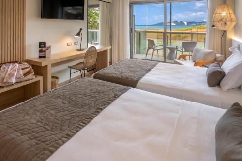 Apartamento Familiar Prime con vistas laterales al mar del hotel Serhs Natal Grand and Resort. Foto 3