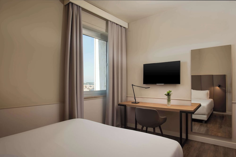 Habitación superior (Extra Large) del hotel Nh Napoli Panorama. Foto 4