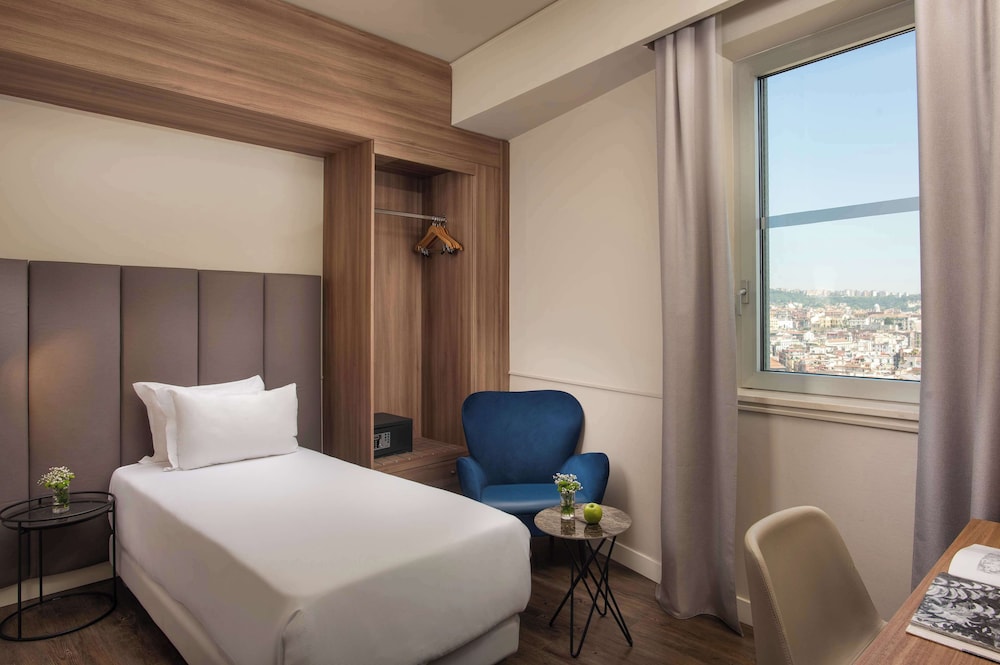 Habitación individual estándar, vistas a la ciudad del hotel Nh Napoli Panorama. Foto 3