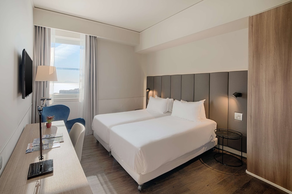 Habitación familiar (Adjoining Room 4 Adults) del hotel Nh Napoli Panorama