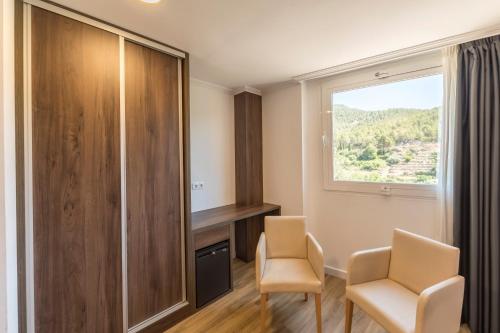 Habitación Doble con vistas al río - 1 o 2 camas del hotel Rosaleda Del Mijares. Foto 4