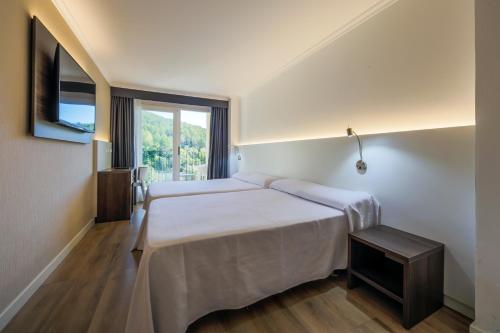 Habitación Doble Premium con vistas al río - 1 o 2 camas del hotel Rosaleda Del Mijares. Foto 2