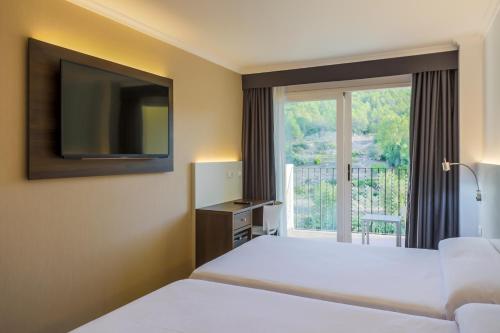 Habitación Doble Premium con vistas al río - 1 o 2 camas del hotel Rosaleda Del Mijares. Foto 4