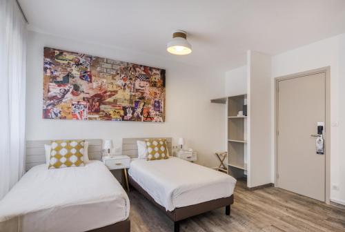 Habitación Doble Estándar - 2 camas del hotel La Maison Mulhouse Centre. Foto 5