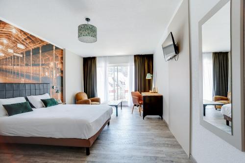 Habitación Doble Grande del hotel La Maison Mulhouse Centre. Foto 9
