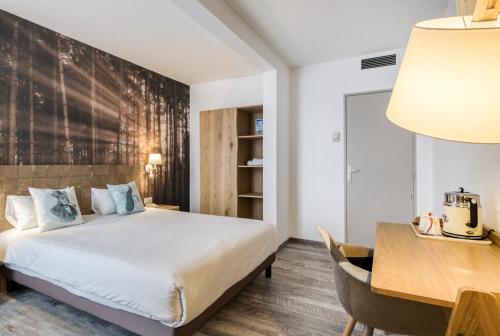 Habitación Doble Estándar del hotel La Maison Mulhouse Centre. Foto 3