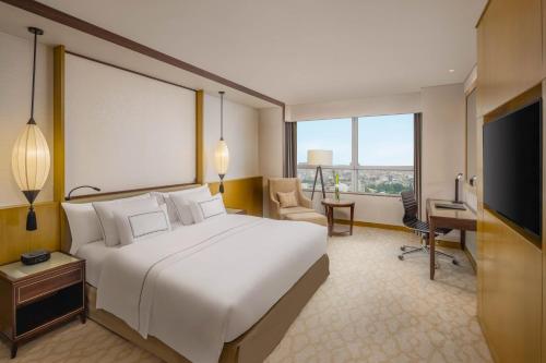 Habitación Doble Premium del hotel Melia Hanoi. Foto 3