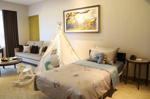 Suite Familiar del hotel Melia Hanoi. Foto 1