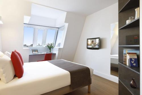 Habitación Doble Clásica del hotel Citadines Maine Montparnasse. Foto 1