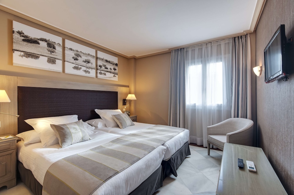 Villa Vista Jardín 2 habitaciones 2 Camas individuales del hotel Barceló Montecastillo Golf. Foto 6