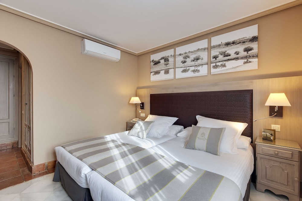 Villa Vista Jardín 2 habitaciones 2 Camas individuales del hotel Barceló Montecastillo Golf. Foto 10