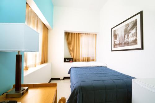 Habitación Doble Deluxe con baño privado del hotel YMCA WEST SIDE