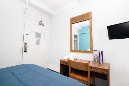 Habitación Doble Deluxe con baño privado del hotel YMCA WEST SIDE. Foto 3