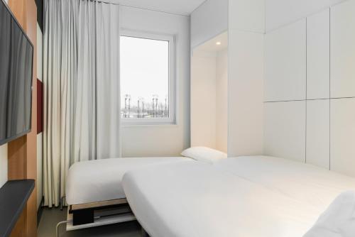 Habitación Triple del hotel Ibis Budget Blankenberge. Foto 4