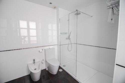 Habitación cuádruple del hotel Petit Palace Santa Cruz. Foto 1