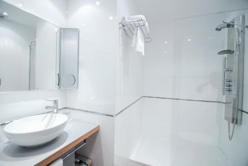 Habitación Triple del hotel Petit Palace Santa Cruz