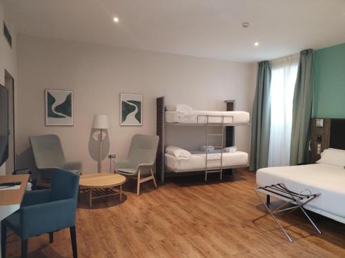 Habitación Cuádruple Superior del hotel Petit Palace Santa Cruz