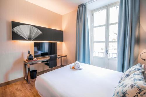 Habitación Doble del hotel Petit Palace Santa Cruz. Foto 2