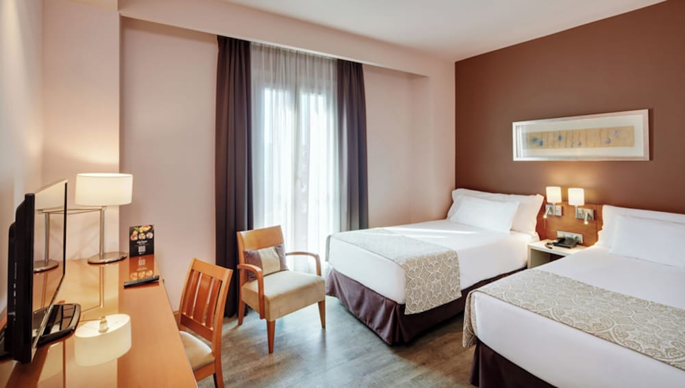 Habitación clásica con 2 camas individuales del hotel Sercotel Alcalá 611