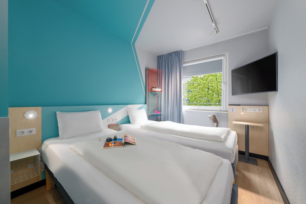 Habitaciones TWIN con dos camas individuales del hotel Ibis Budget Leipzig City. Foto 1