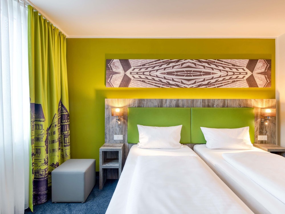 Habitación doble con dos camas individuales: 2 camas individuales (90 x 200 cm) del hotel Ibis Styles Tubingen. Foto 3