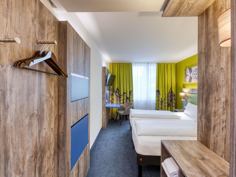 Habitación doble con dos camas individuales: 2 camas individuales (90 x 200 cm) del hotel Ibis Styles Tubingen. Foto 4