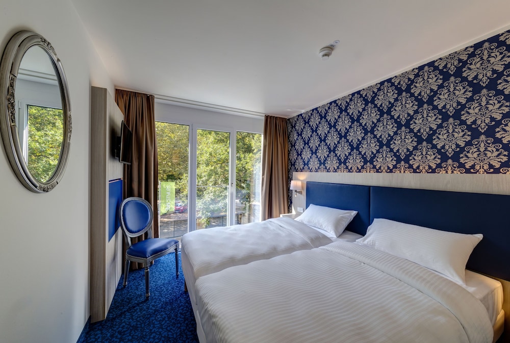 Habitación Gemela Confort: 2 camas individuales (100 x 200 cm) del hotel Ibis Styles Rastatt Baden Baden. Foto 3