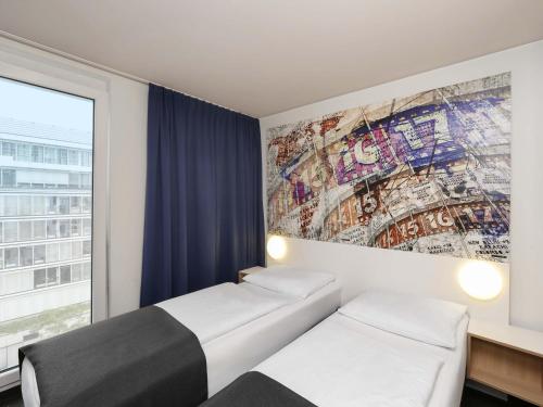 Habitación Doble Estándar - 2 camas del hotel Berlin Alexanderplatz. Foto 1
