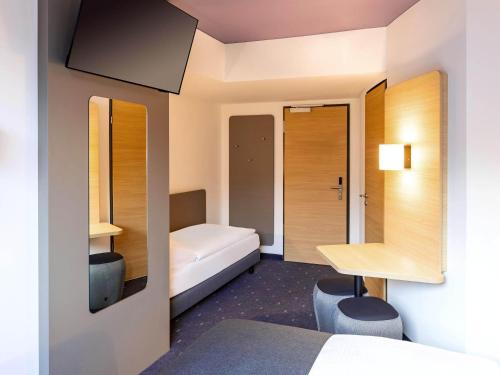 Habitación Triple del hotel Berlin Alexanderplatz. Foto 2