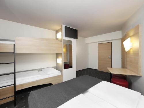 Habitación Familiar del hotel Berlin Alexanderplatz. Foto 1
