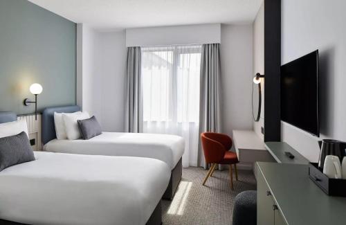 Habitación Doble con cama supletoria del hotel Leonardo Parnell Street
