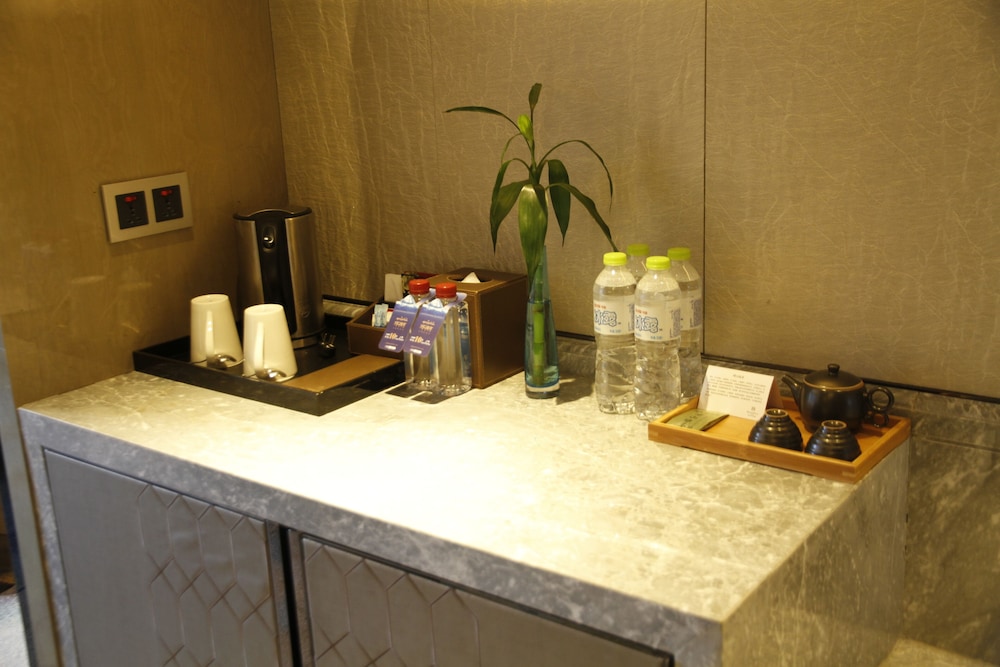 Habitación Superior, una cama King, Vistas a la Ciudad del hotel Pullman Yantai Center. Foto 5