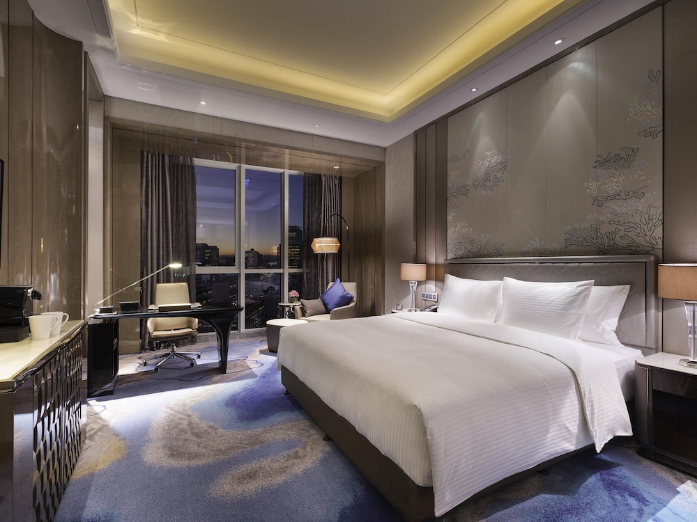HABITACIÓN DELUXE, Una Cama King, Piso Alto y Vistas a la Ciudad del hotel Pullman Yantai Center