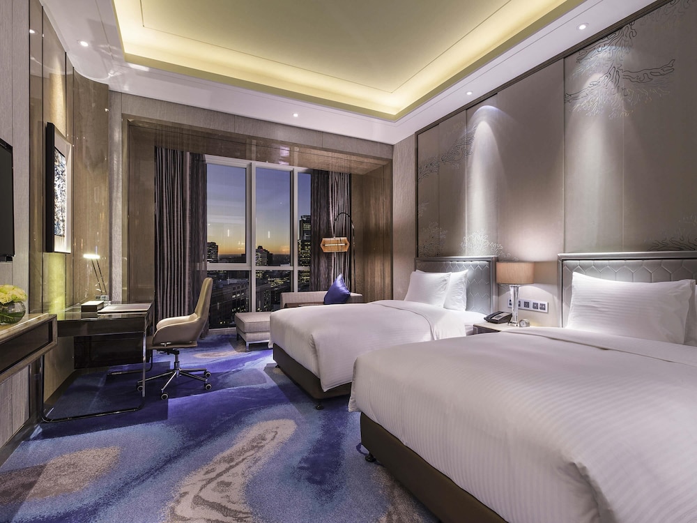 HABITACIÓN DELUXE, Dos Camas Individuales, Piso Alto y Vistas a la Ciudad del hotel Pullman Yantai Center