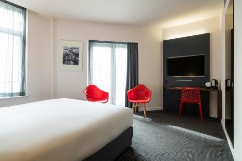 Habitación Premium con cama extragrande del hotel Aris Grand-place. Foto 1