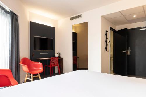 Habitación Premium con cama extragrande del hotel Aris Grand-place. Foto 3