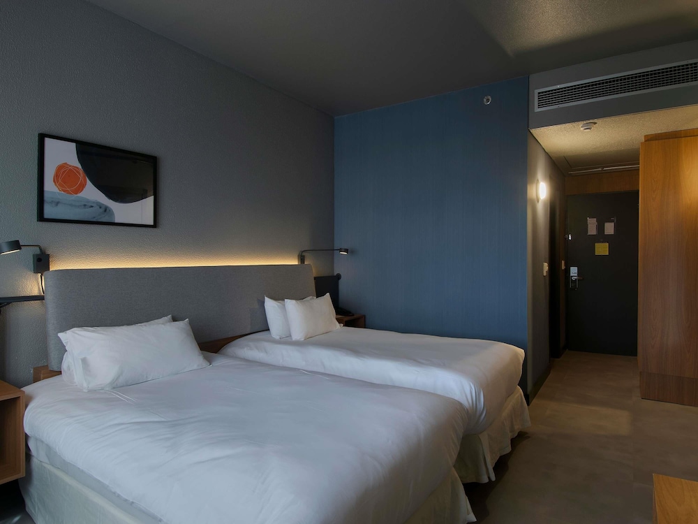 Habitación superior con 2 camas individuales del hotel Novotel Porto Alegre Tres Figueiras. Foto 6