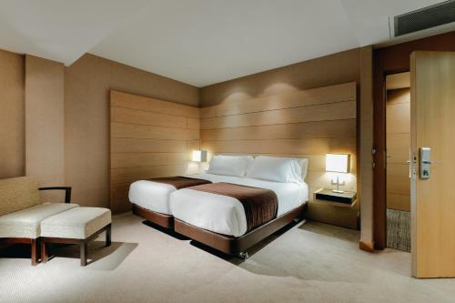 Habitación Doble Estándar con cama supletoria - 1 o 2 camas del hotel Hesperia Bilbao
