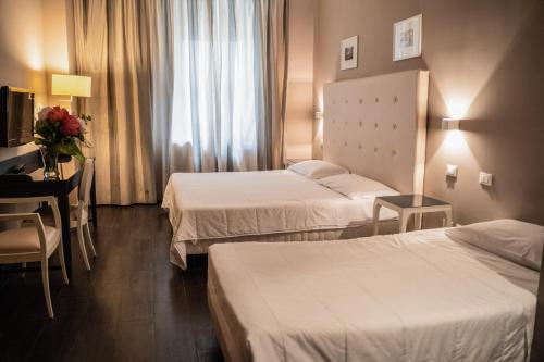 Habitación Cuádruple Superior del hotel Mediterraneo. Foto 3