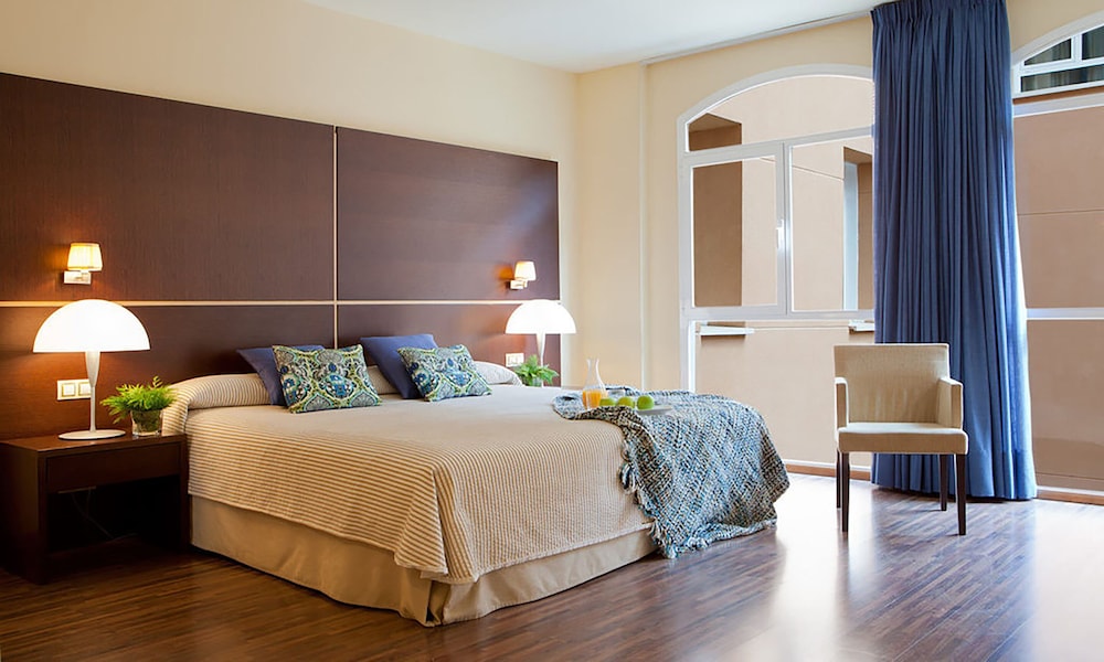 Habitación Doble con Salón del hotel Rice Palacio De Los Blasones. Foto 1